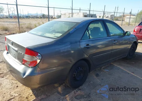 2003 Toyota Camry Le z USA, uszkodzony, nr VIN 4T1BE30K13U725595